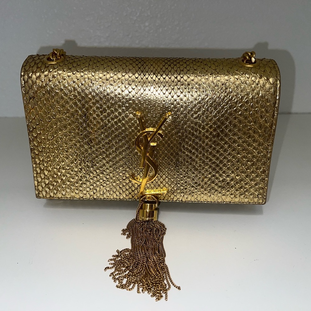 Yves Saint Laurent Gold Clutch with Tassel